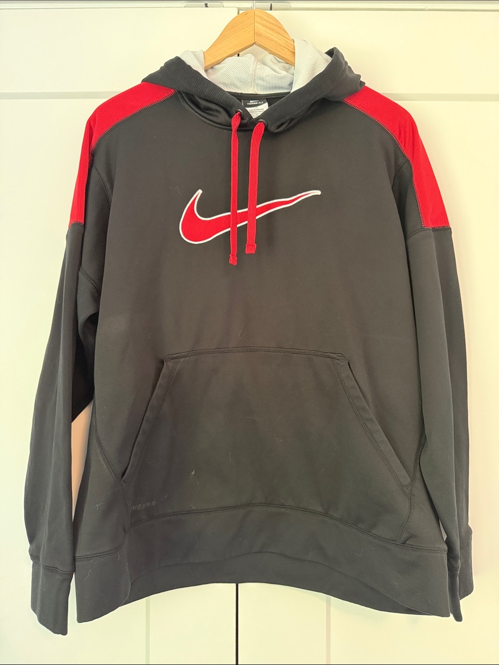 Nike Black Hoodie with Red Swoosh and Shoulder Panels